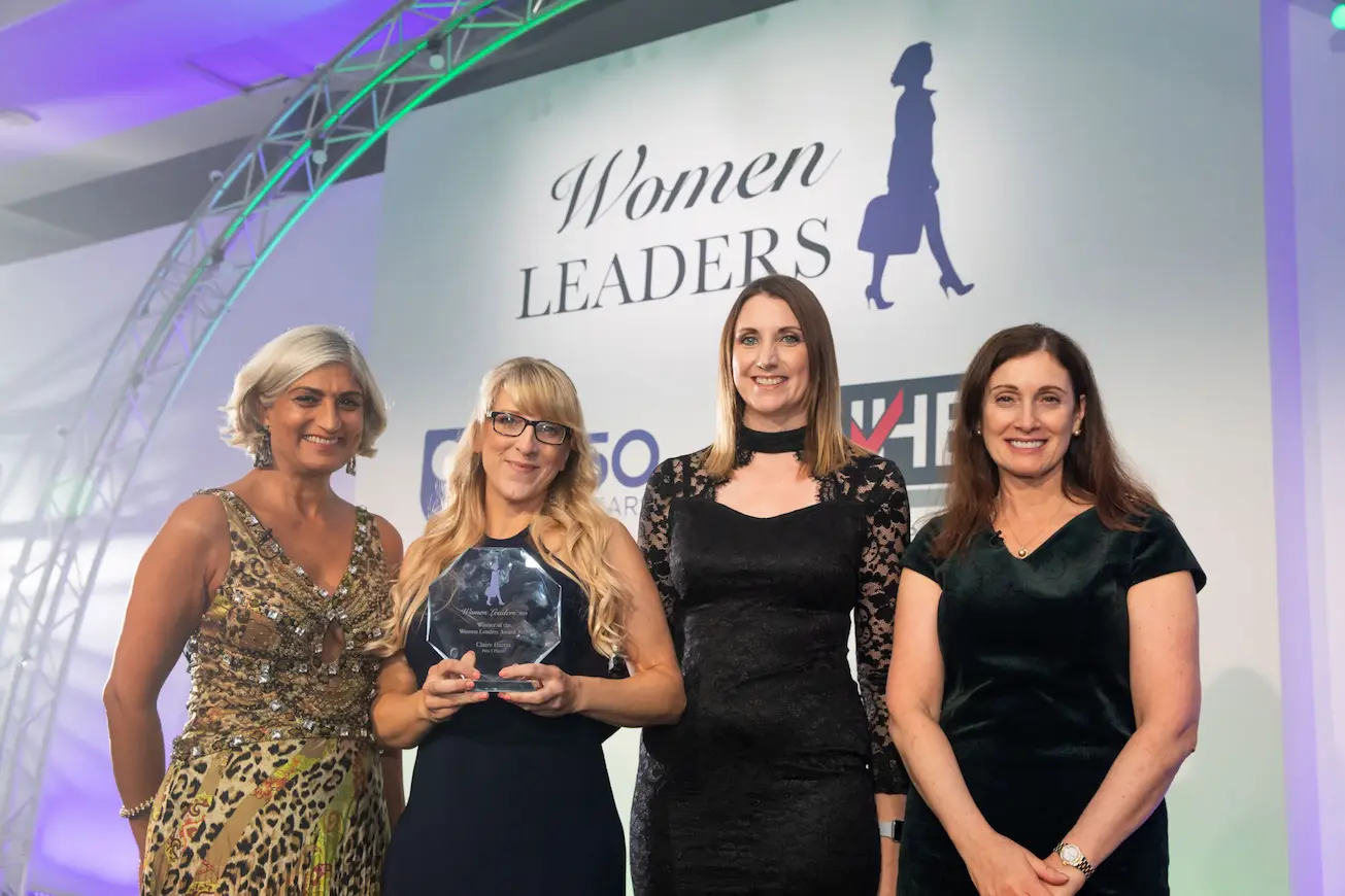Claire Harris collecting a Women Leaders Award for Pets 2 Places